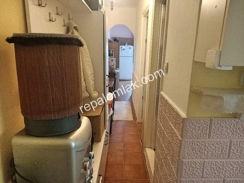Ayvalık Sarımsaklı' da, Denize Sıfır 1+1 Satılık Daire.