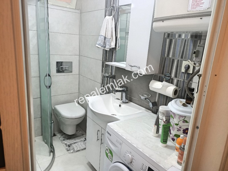 Ayvalık Sarımsaklı' da, Denize Sıfır 1+1 Satılık Daire.