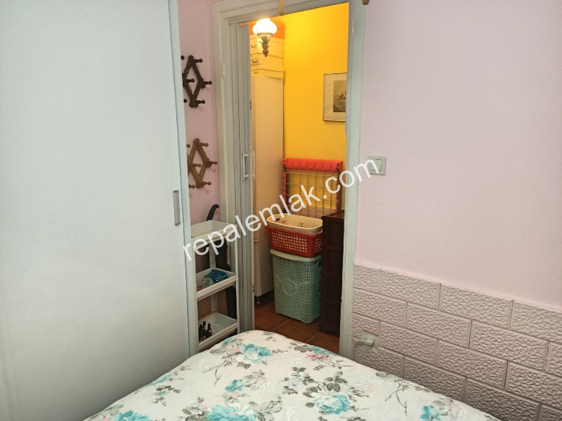Ayvalık Sarımsaklı' da, Denize Sıfır 1+1 Satılık Daire.