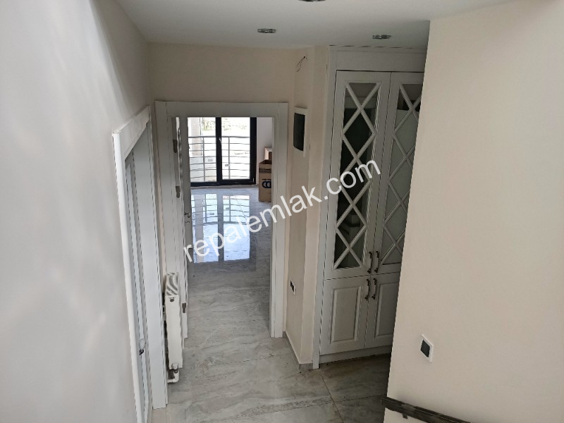 Sarımsaklı' da Deniz Manzaralı Süper Lüks, Satılık Sıfır Müstakil Tripleks Villa.