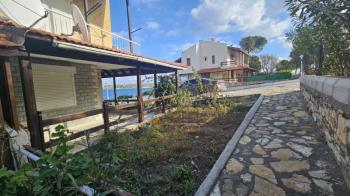 Antre Emlak'tan Satılık Çeşme Dalyan'da Denize Sıfır Tripleks 4+1 Villa