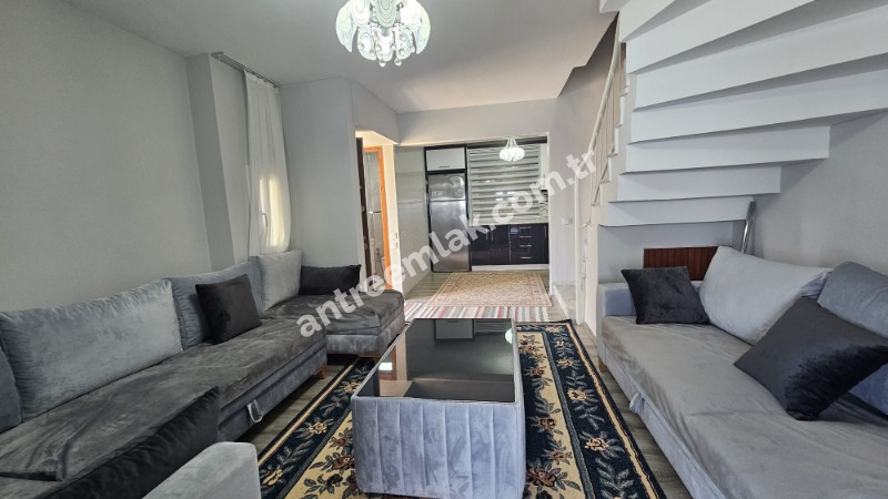 Antre Emlak'tan Satılık Çeşme Dalyan'da Denize Sıfır Tripleks 4+1 Villa