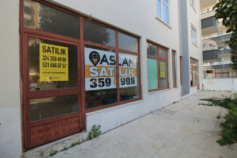 ASLAN'DAN CEVAT KUTLU CADDESİ ÜZERİ SATILIK 100 M2 DÜKKAN