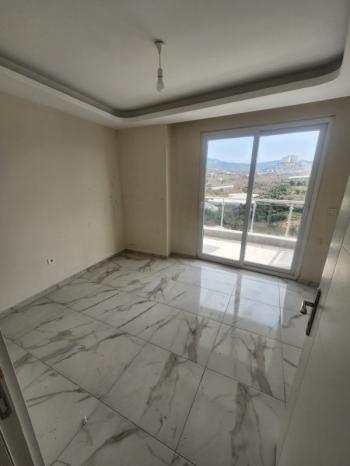 ALANYA MAHMUTLAR SARIHASANLI CADDESİ 2+1 BOŞ 90M2 KUZEY CEPHE 13.000TL