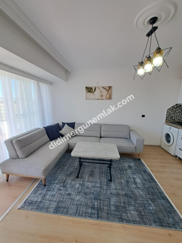 DİDİM ÇAMLIK MAHALLESİNDE KATTA TEK  SATILIK 3+1   DAİRE EK: 1269