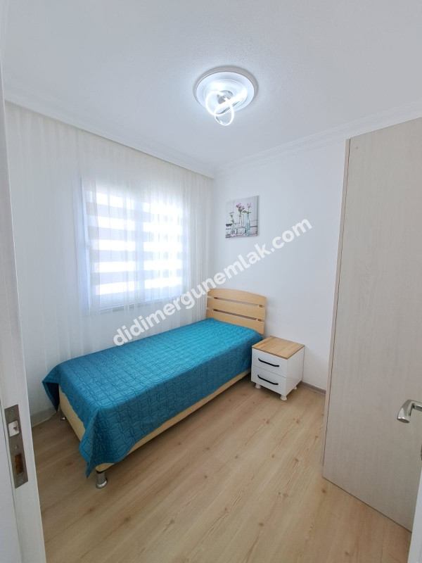 DİDİM ÇAMLIK MAHALLESİNDE KATTA TEK  SATILIK 3+1   DAİRE EK: 1269