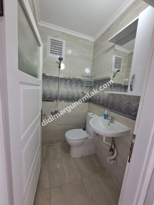 DİDİM ÇAMLIK MAHALLESİNDE KATTA TEK  SATILIK 3+1   DAİRE EK: 1269