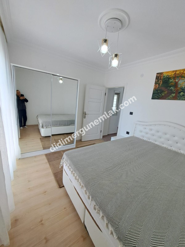 DİDİM ÇAMLIK MAHALLESİNDE KATTA TEK  SATILIK 3+1   DAİRE EK: 1269