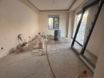 MERKEZİ KONUMDA ÖZEL BAHÇELİ YERDEN ISITMA OTOPARK SIFIR 1+1