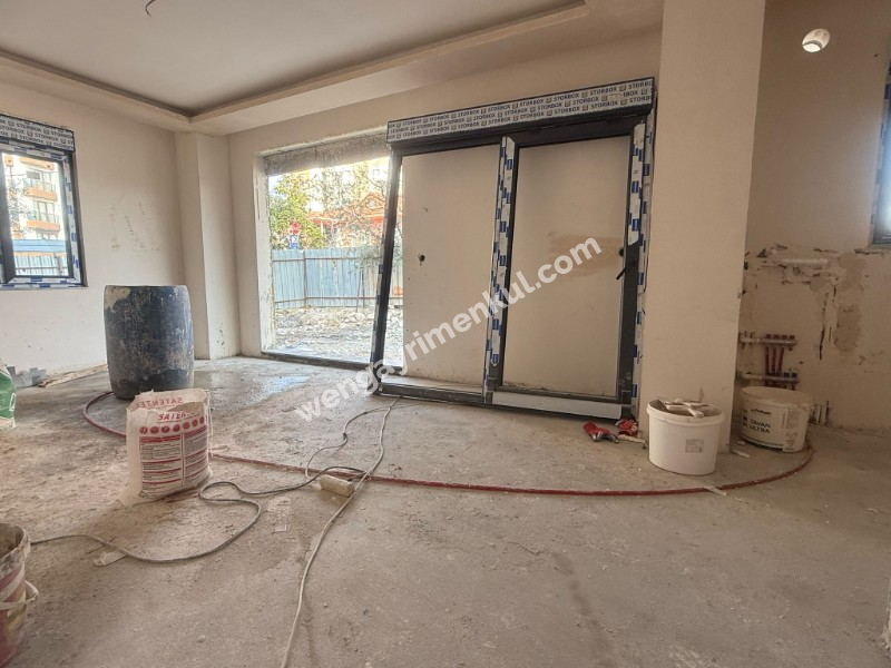 MERKEZİ KONUMDA ÖZEL BAHÇELİ YERDEN ISITMA OTOPARK SIFIR 1+1