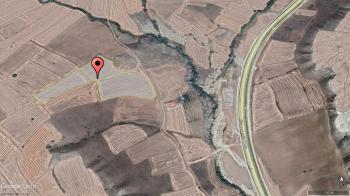 GÜVENAY - ÇORUM OSMANCIK YOLU ÜZERİ 29,477 M² SATILIK TARLA