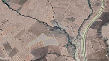 GÜVENAY - ÇORUM OSMANCIK YOLU ÜZERİ 29,477 M² SATILIK TARLA