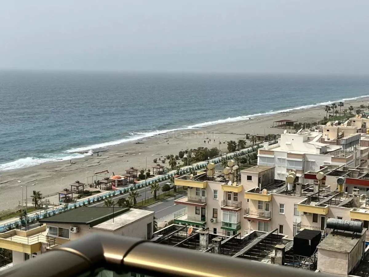 Полностью меблированная квартира 2+1 на берегу моря в Махмутларе, Алания