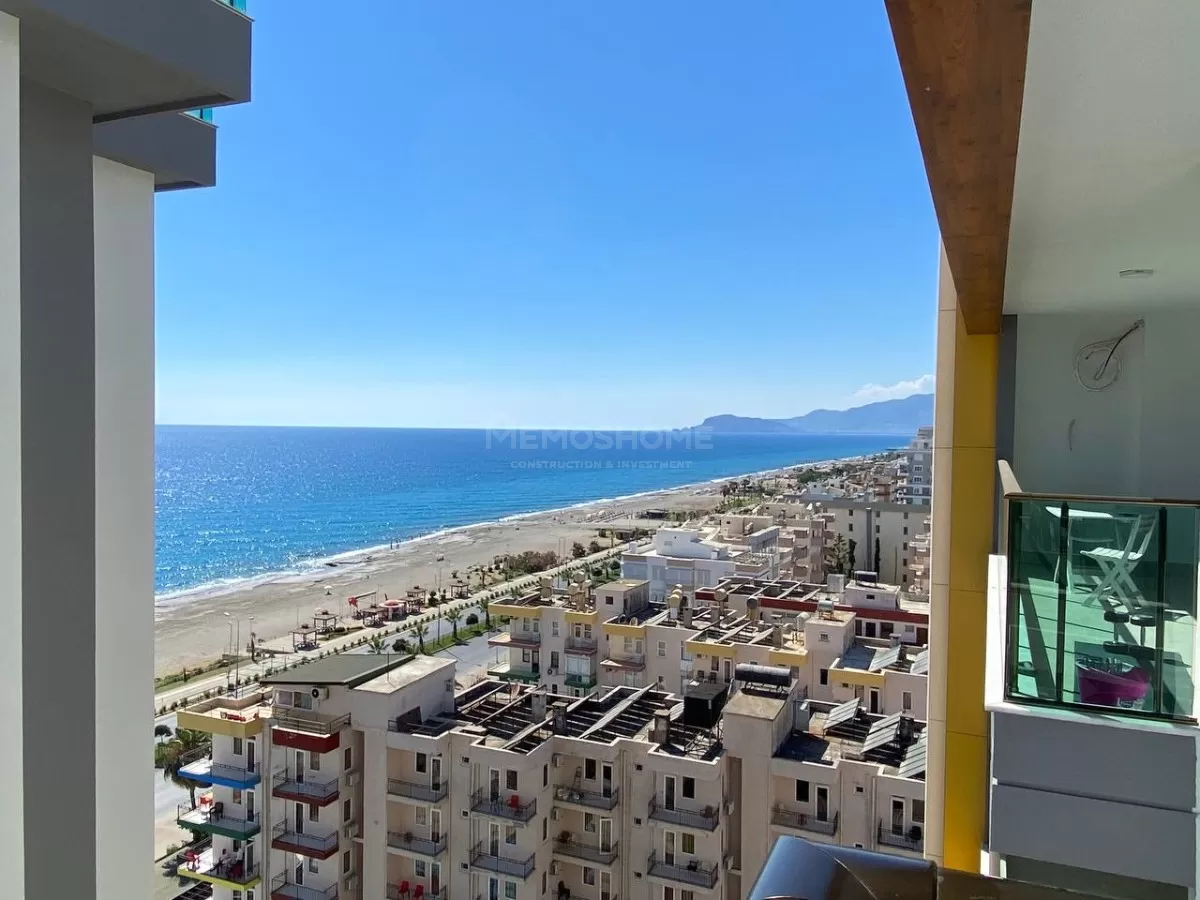 Полностью меблированная квартира 2+1 на берегу моря в Махмутларе, Алания