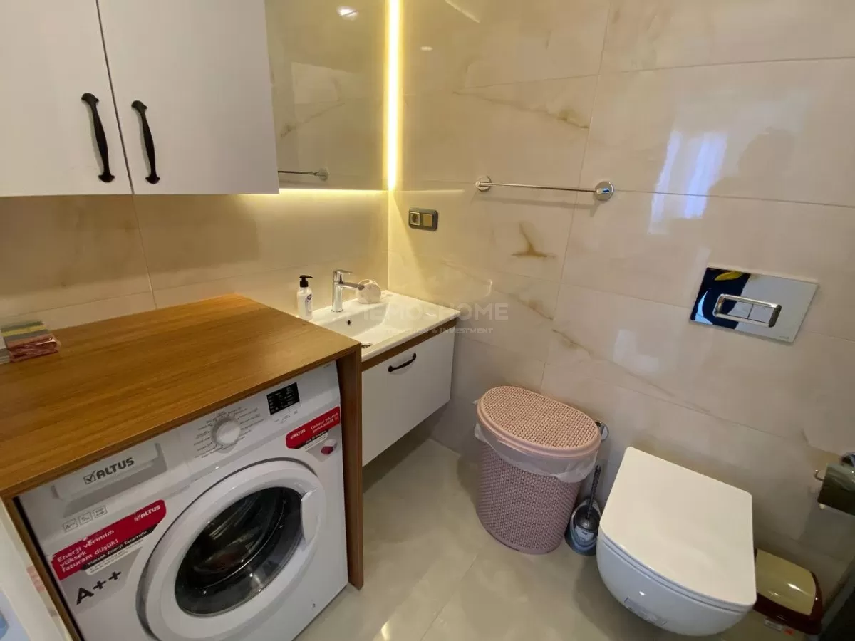 Полностью меблированная квартира 2+1 на берегу моря в Махмутларе, Алания