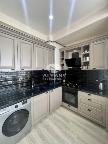 ALYANS'TAN MEZİTLİ'DE MERKEZİ KONUMDA FULL SOSYAL ALANLI 2+1
