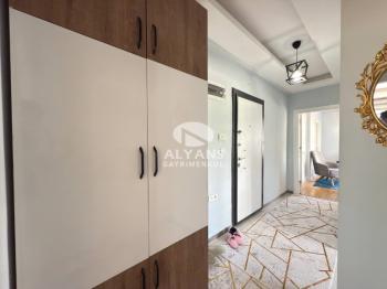ALYANS'TAN MEZİTLİ'DE TEK BLOK OTOPARKLI FULL EŞYALI 2+1