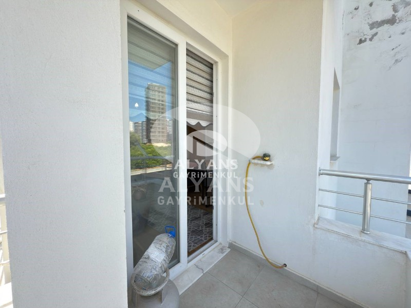 ALYANS'TAN MEZİTLİ'DE TEK BLOK OTOPARKLI FULL EŞYALI 2+1