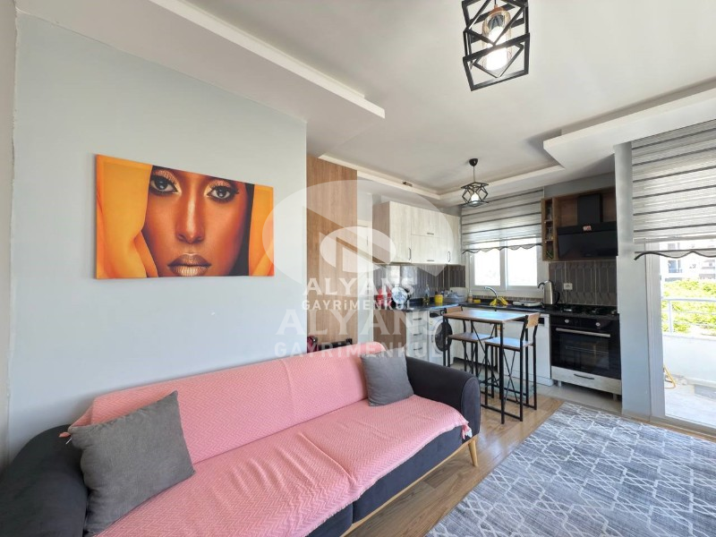 ALYANS'TAN MEZİTLİ'DE TEK BLOK OTOPARKLI FULL EŞYALI 2+1