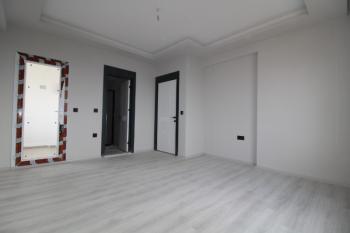 ASLAN'DAN DAĞ VE DENİZ MANZARALI GENİŞ METRAJLI SIFIR 2+1