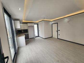 Didim Efeler Mahallesinde Merkezi Konumlu 1+1 Bahçe Katı Sıfır Daire ek - 919