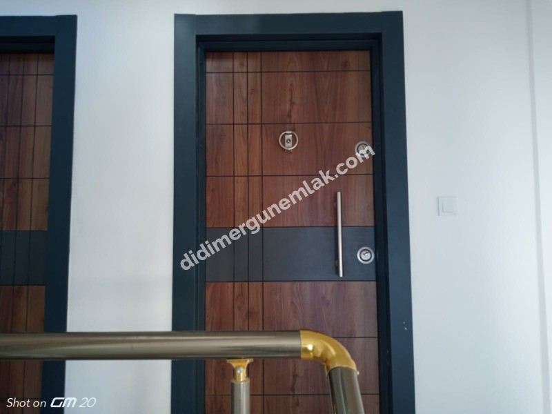 DİDİM CUMHURİYET MAHALLESİNDE ŞIK TASARIMLI 2+1 DAİRE EK- 424