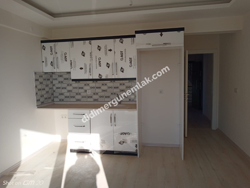 DİDİM CUMHURİYET MAHALLESİNDE ŞIK TASARIMLI 2+1 DAİRE EK- 424