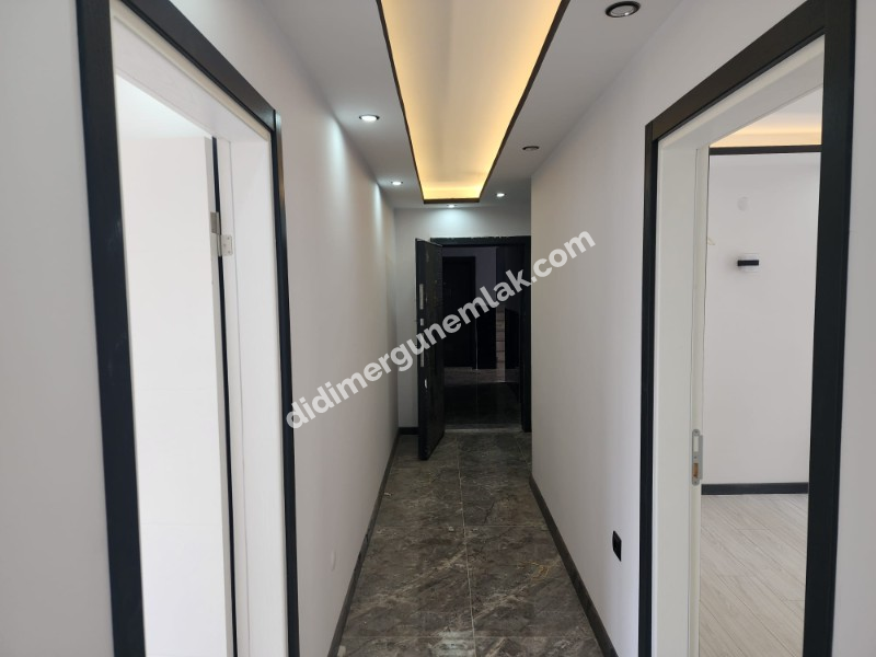 Didim Efeler Mahallesinde Merkezi Konumlu 1+1 Bahçe Katı Sıfır Daire ek - 919
