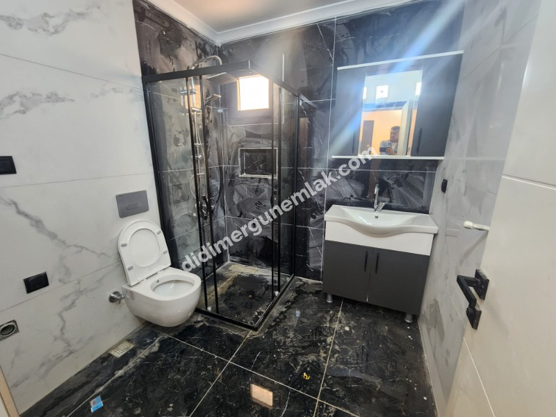 Didim Efeler Mahallesinde Merkezi Konumlu 1+1 Bahçe Katı Sıfır Daire ek - 919