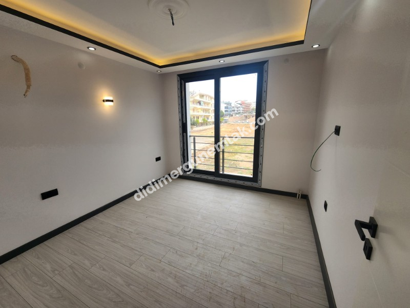 Didim Efeler Mahallesinde Merkezi Konumlu 1+1 Bahçe Katı Sıfır Daire ek - 919