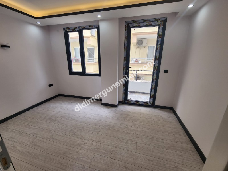 Didim Efeler Mahallesinde Merkezi Konumlu 1+1 Bahçe Katı Sıfır Daire ek - 919