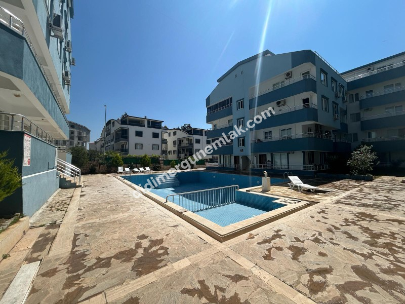DİDİM ERGÜN EMLAK\\\\\\\\\\\\\\\'TAN SATILIK 1+1 HAVUZLU SİTEDE EŞYALI ARA KAT DAİRE ! EK- 5591