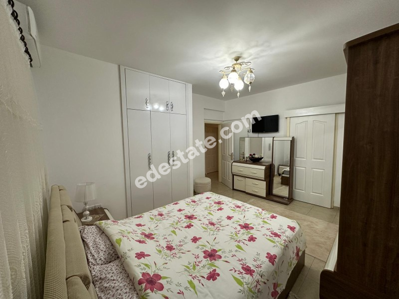 Girne Lapta Bölgesinde Satılık Site İçerisinde HAVUZLU 3+1 ZEMİN KAT Daire