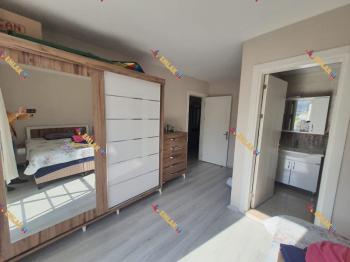 KUŞADASI DAVUTLARDA HAVUZLU SİTEDE GENİŞ DENİZ MANZARALI 2+1 SATILIK DAİRE