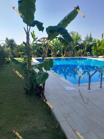 KUŞADASI DAVUTLARDA HAVUZLU SİTEDE GENİŞ DENİZ MANZARALI 2+1 SATILIK DAİRE