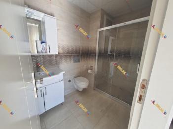 KUŞADASI DAVUTLARDA HAVUZLU SİTEDE GENİŞ DENİZ MANZARALI 2+1 SATILIK DAİRE