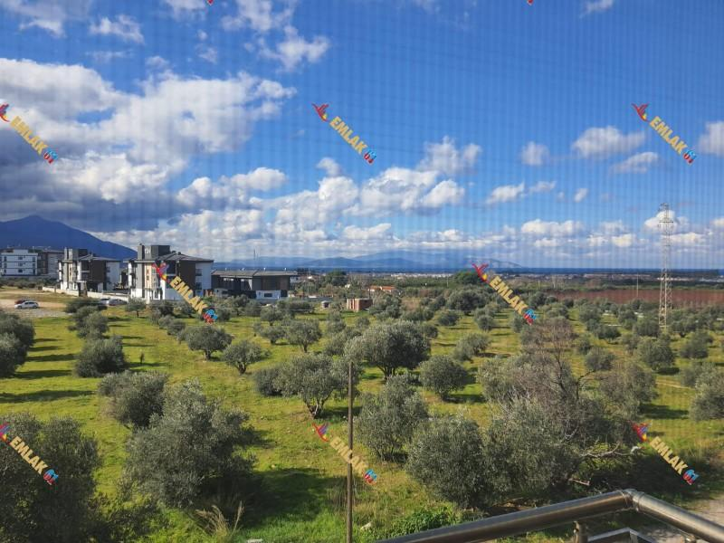 KUŞADASI DAVUTLARDA HAVUZLU SİTEDE GENİŞ DENİZ MANZARALI 2+1 SATILIK DAİRE