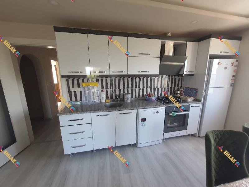 KUŞADASI DAVUTLARDA HAVUZLU SİTEDE GENİŞ DENİZ MANZARALI 2+1 SATILIK DAİRE
