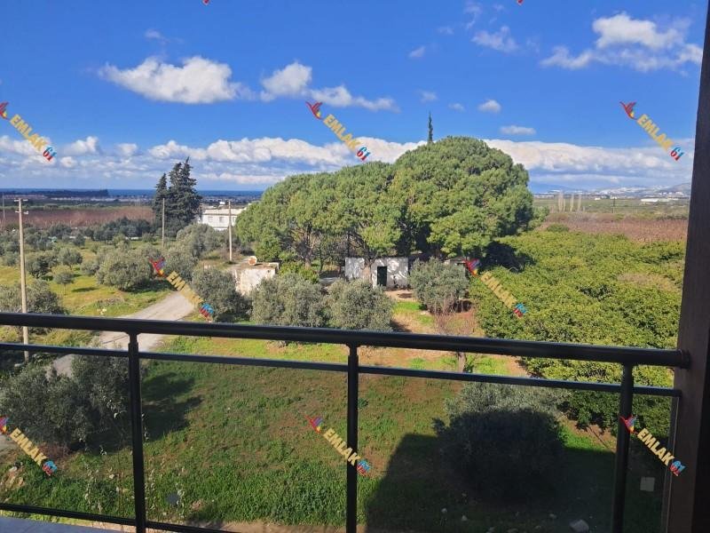 KUŞADASI DAVUTLARDA HAVUZLU SİTEDE GENİŞ DENİZ MANZARALI 2+1 SATILIK DAİRE