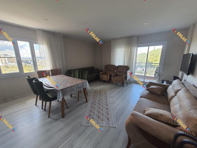 KUŞADASI DAVUTLARDA HAVUZLU SİTEDE GENİŞ DENİZ MANZARALI 2+1 SATILIK DAİRE