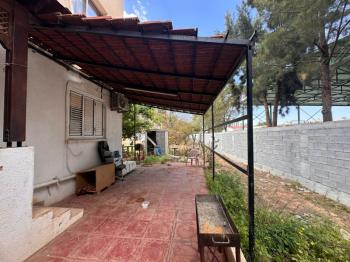 KIBRIS MAĞUSA BÖLGESİNDE ZEMİNKAT BAHÇELİ SATILIK DAİRE