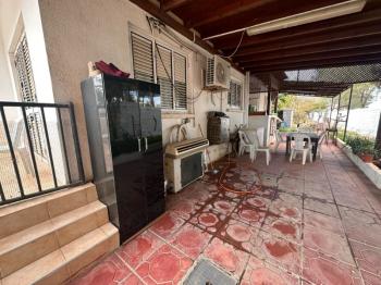 KIBRIS MAĞUSA BÖLGESİNDE ZEMİNKAT BAHÇELİ SATILIK DAİRE