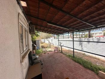 KIBRIS MAĞUSA BÖLGESİNDE ZEMİNKAT BAHÇELİ SATILIK DAİRE