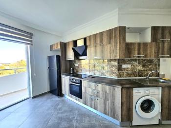 Girne Karaoğlanoğlu'nda Deniz Manzaralı Eşyalı Kiralık 1+1 Daire