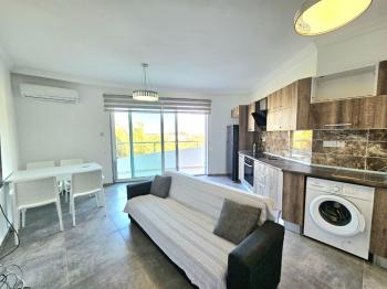 Girne Karaoğlanoğlu'nda Deniz Manzaralı Eşyalı Kiralık 1+1 Daire