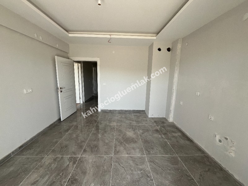 KAHVECİOĞLU EMLAK'DAN YEŞİLYURT MAH SATILIK DAİRE 4+1