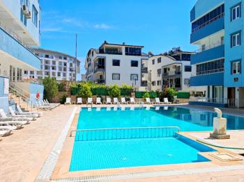 Goldsand 2 Sitesinde Satılık Eşyalı Yüksek Giriş 1+1 Daire