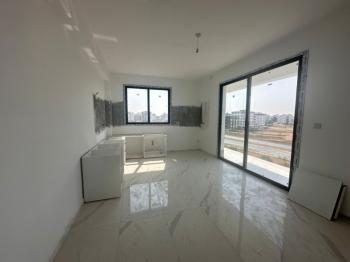 MAĞUSA MERKEZDE  YENİ SIFIR SATILIK  DAİRE 