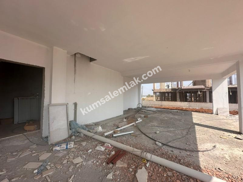 MAĞUSA MERKEZDE  YENİ SIFIR SATILIK  DAİRE 