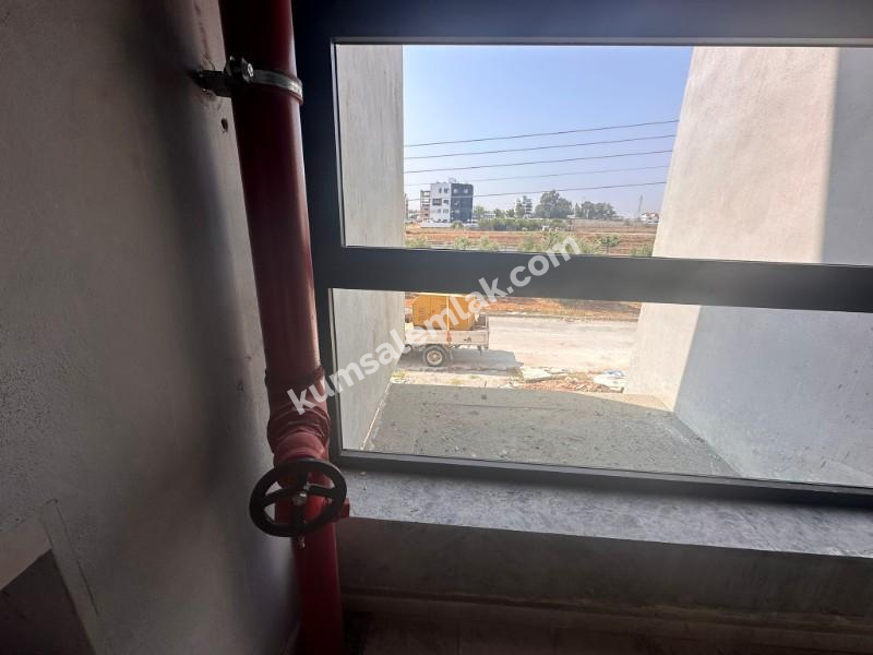 MAĞUSA MERKEZDE  YENİ SIFIR SATILIK  DAİRE 